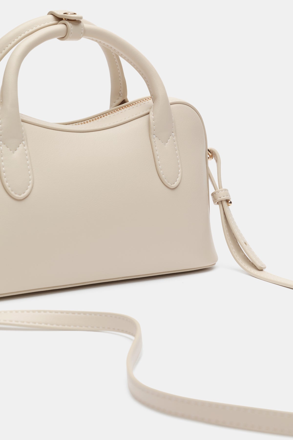 Curved Mini Crossbody Bag