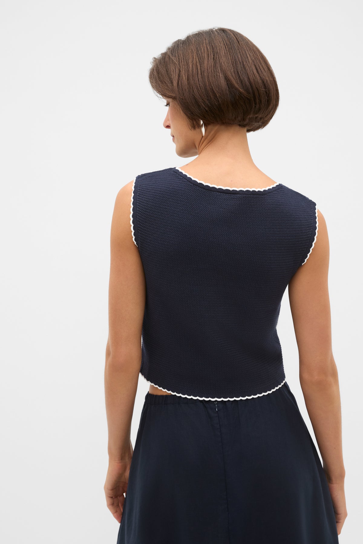 Textured Mini Scallop Knit Top